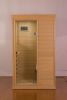 Hemlock Mini one person far infrared door on the left of the indoor sauna room